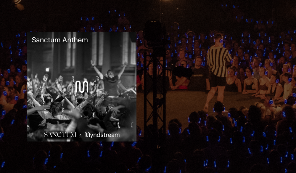 Sanctum Anthem artwork over a concert crowd